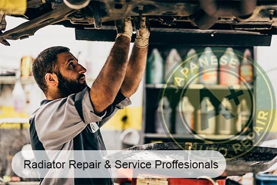 A worker checking a car's radiator - A+ Japanese Auto Repair - Radiator Repair & Service Professionals